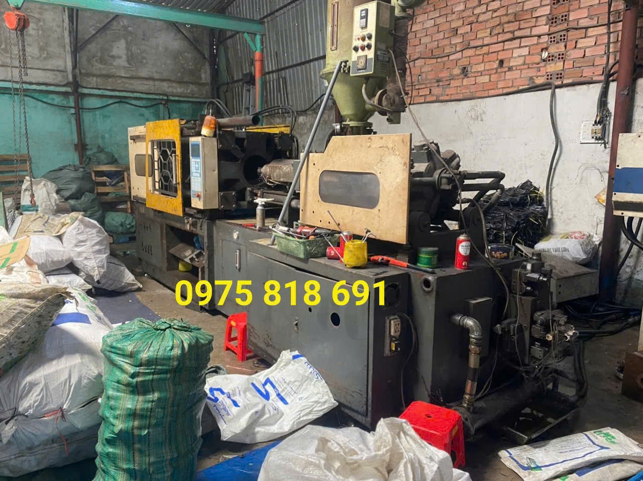 thu mua may moc cu quan 9